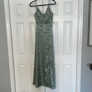 Lulus floor length gown. Light sage green color with slit.
